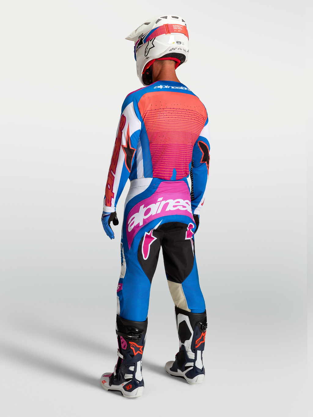 Alpinestars Jersey Techstar Maven y Techstar Maven Gear Set, conjunto de motocross azul y coral para hombre, vista trasera.