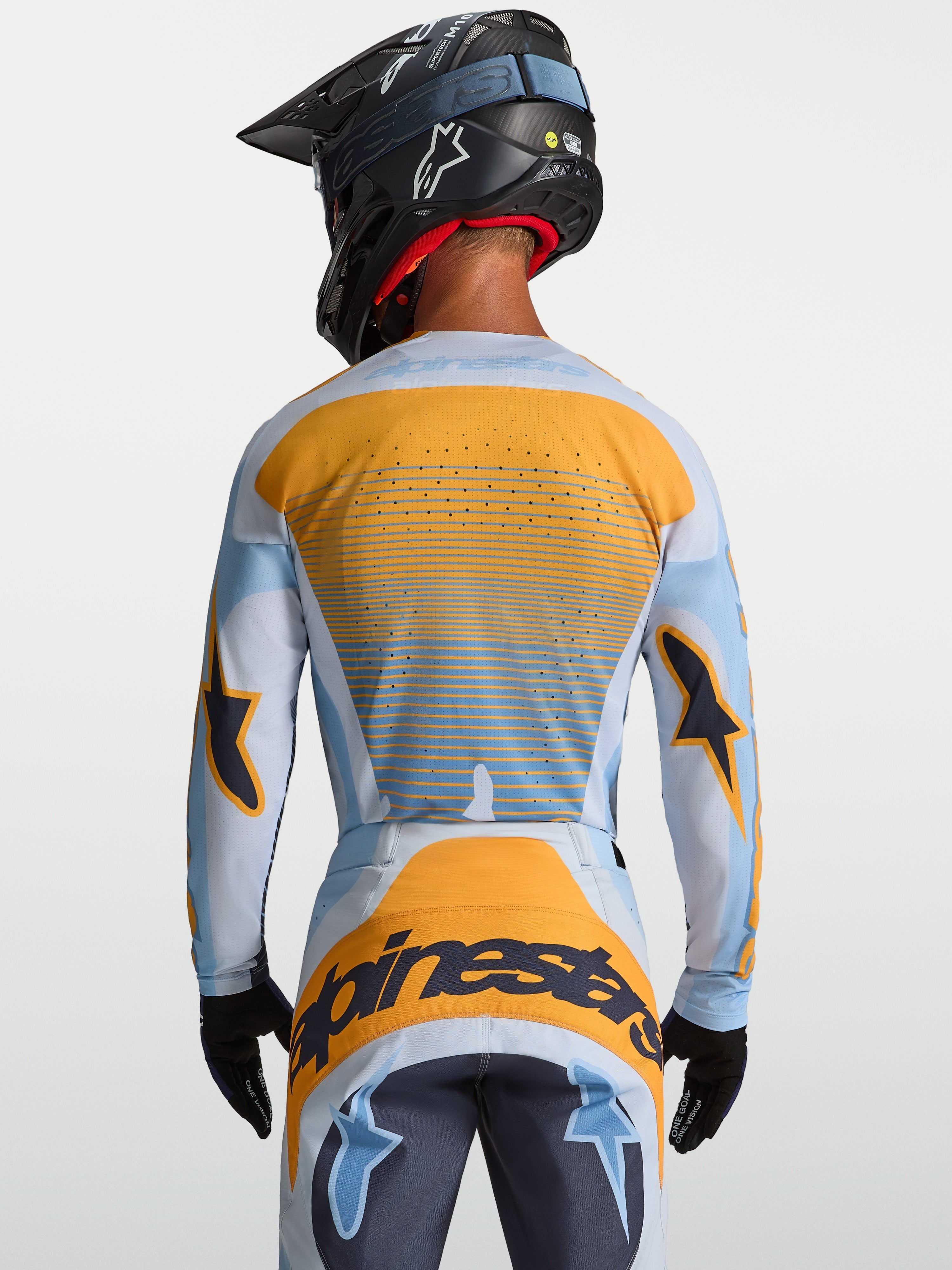 Alpinestars Techstar Maven, jersey de motocross para hombre, azul y naranja, vista trasera con ventilación cortada con láser
