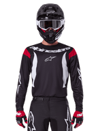 Alpinestars 2025 Fluid Haul Jersey and Gear Set for men, black and white motocross outfit with red accents.