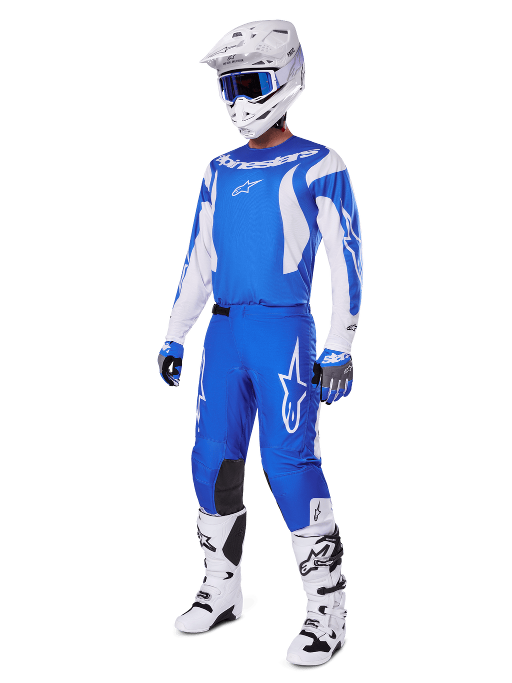 Motocross rider wearing the complete 2025 Fluid Haul Gear Set, Blue and White jersey and pants with Alpinestars branding, white helmet with blue goggles, white boots, and blue gloves, coordinated racing outfit for off-road motocross.