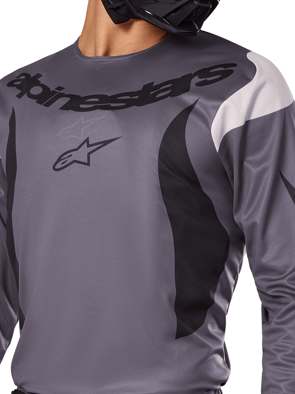 Alpinestars Fluid Haul Jersey 2025, jersey de motocross, gris con detalles en negro y blanco, con el logotipo y el nombre de la marca Alpinestars en el pecho, ajuste deportivo para carreras off-road