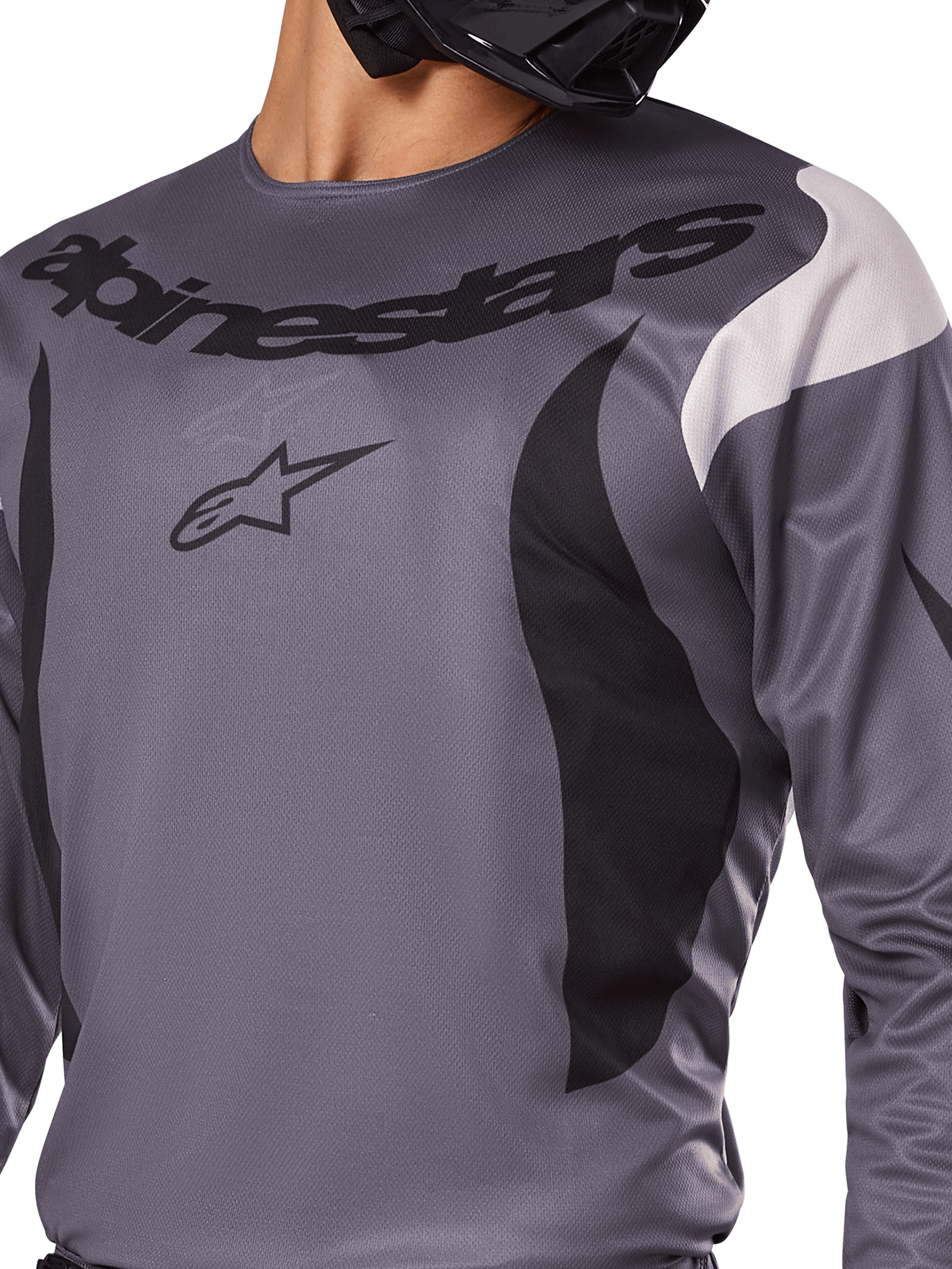 Alpinestars Fluid Haul Jersey 2025, jersey de motocross, gris con detalles en negro y blanco, con el logotipo y el nombre de la marca Alpinestars en el pecho, ajuste deportivo para carreras off-road