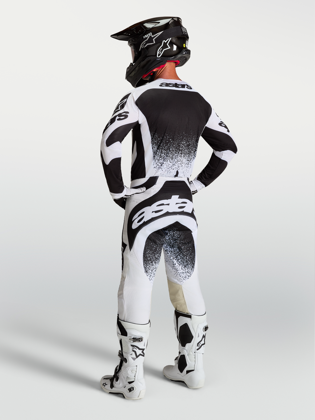 Alpinestars Techstar Swan, jersey y conjunto de motocross, hombre, blanco y negro con gráficos de salpicadura, vista trasera