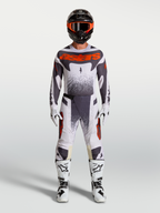 Alpinestars Techstar Swan Gear Set, conjunto de motocross para hombre, gris y rojo fluorescente, diseño elástico para alto rendimiento.