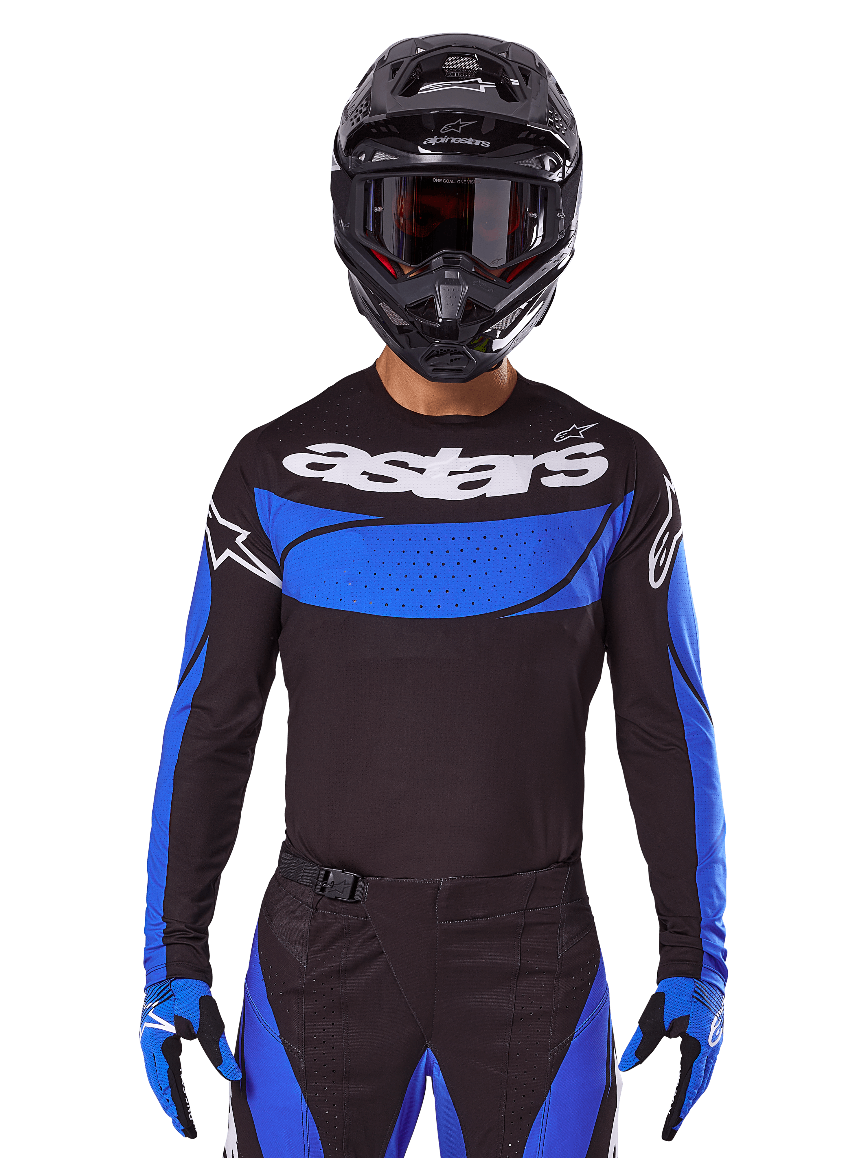 Alpinestars conjunto Techstar Dreem 2025 y jersey Techstar Dreem 2025, equipo de motocross negro y azul, usado por un piloto.
