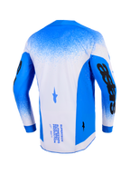 Alpinestars 2026 Supertech Scenz Jersey, back view, Ucla Blue and White, professional motocross jersey with mesh construction and laser-cut perforations, featuring bold black sleeve graphics and technical branding on the back.