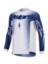 Jersey Alpinestars Supertech Scenz 2026, jersey de motocross, gris claro y azul oscuro, con marca Astars en azul oscuro en el pecho y las mangas, patrón de motas en degradado, perforaciones cortadas con láser para ventilación, equipamiento de competición off-road de nivel profesional