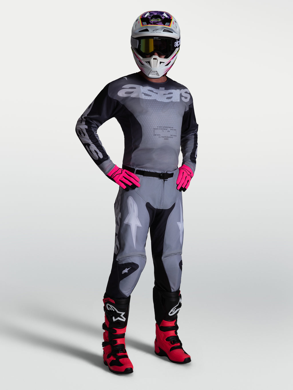 Alpinestars Racer Amber 2027 jersey y equipación de motocross para hombre, gris y rosa, con ajuste deportivo.