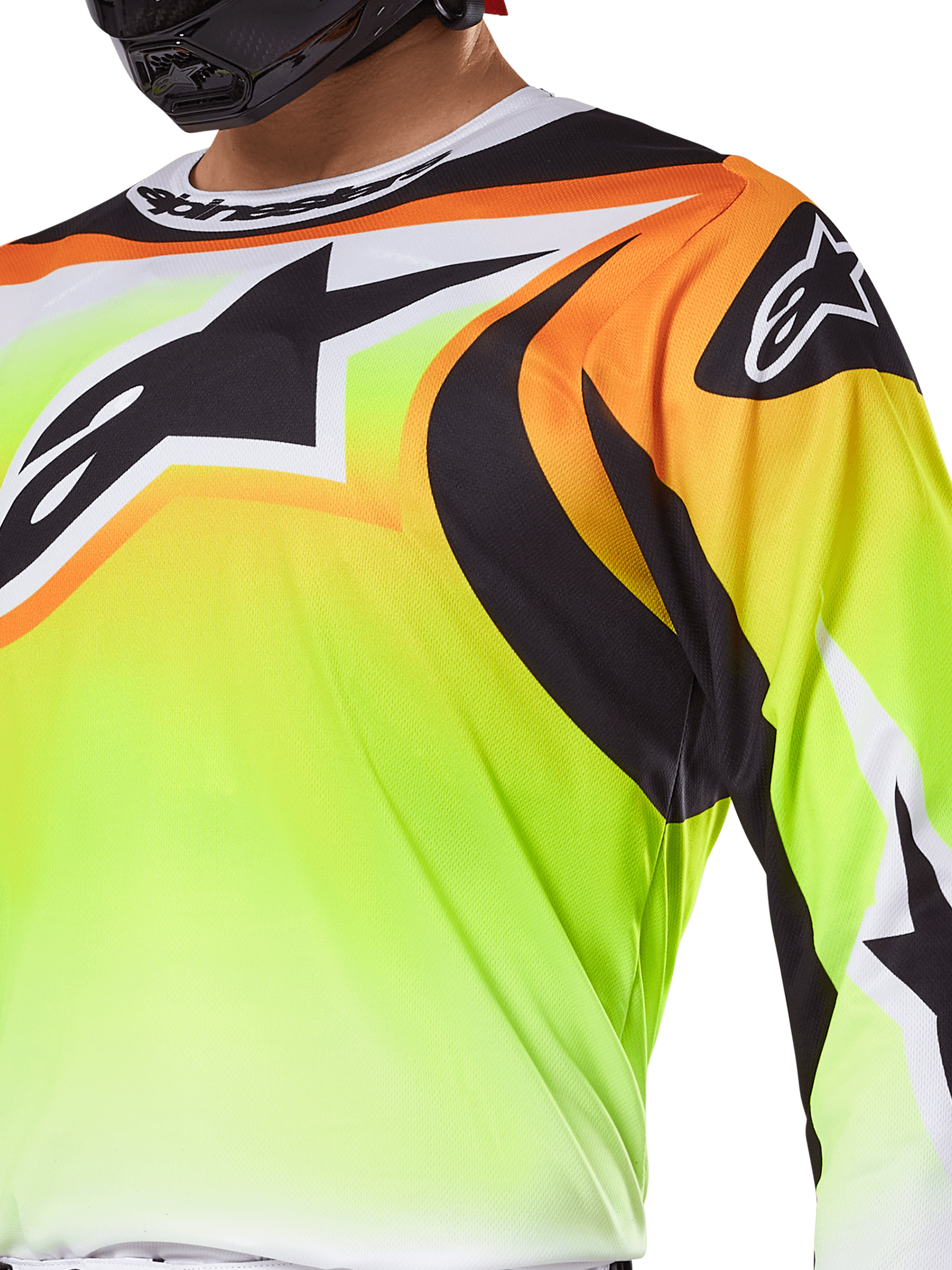 Alpinestars 2025 Fluid Wurx Jersey, Motocross Jersey, Fluorescent Yellow with Black and Orange graphics, featuring a large black Alpinestars logo on the chest and shoulder, worn by a rider with a black helmet.