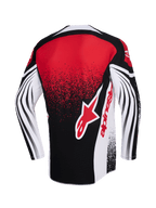 Jersey Alpinestars Techstar Nomur 2026, jersey de motocross, negro, blanco y rojo, vista trasera con un gran logotipo rojo de Alpinestars, efecto de degradado moteado y patrones curvos dinámicos en las mangas largas, ropa técnica de competición