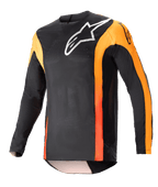 Alpinestars Techstar Sein Jersey 2023, jersey de motocross de manga larga, negro con detalles en naranja vibrante, logo blanco de Alpinestars en el pecho, tejido de malla ligero y transpirable, ajuste atlético de competición