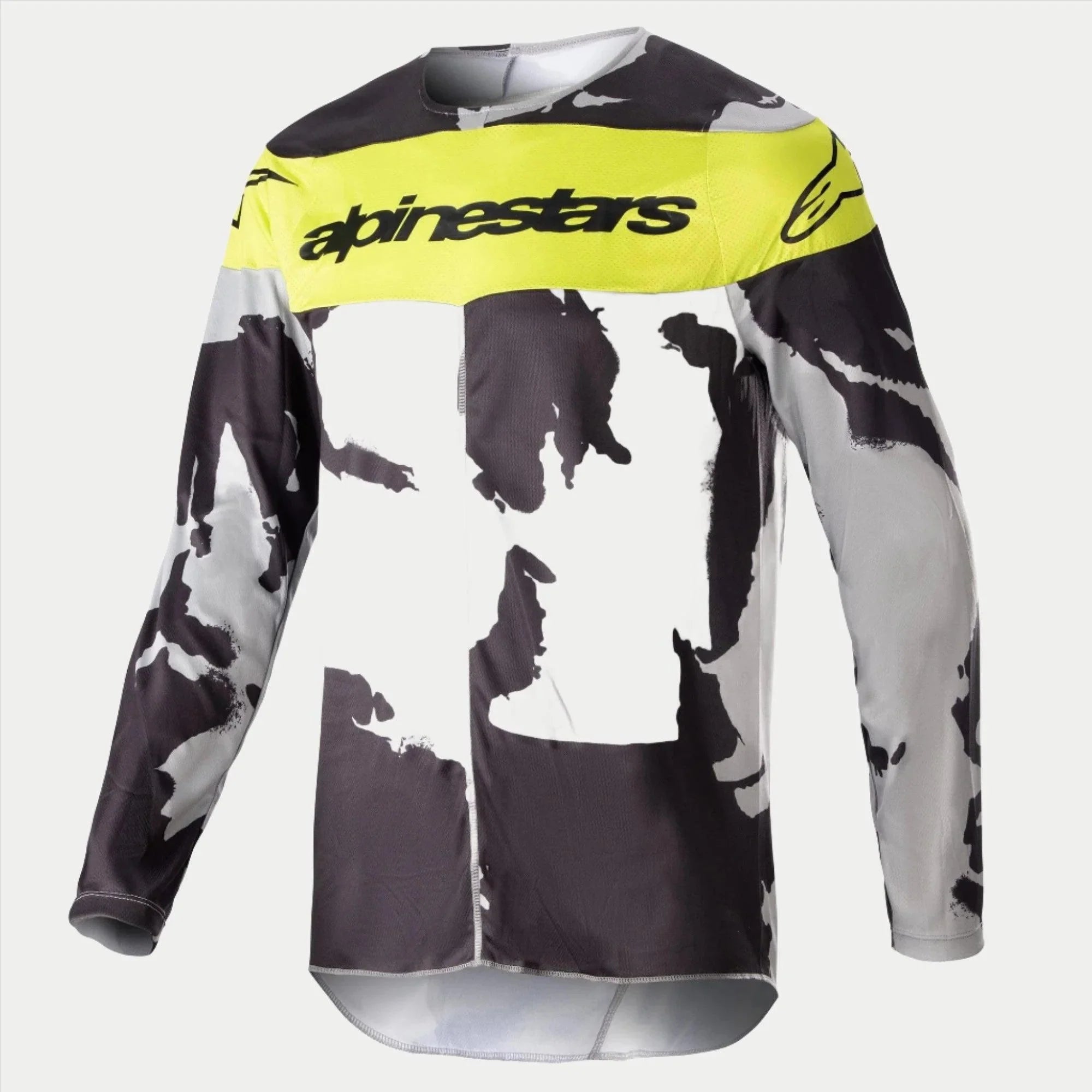 Alpinestars 2023 Racer Tactical Jersey, jersey de motocross, camuflaje gris y amarillo flúor, con un patrón de camuflaje gris y negro con un panel amarillo brillante en el pecho y el logotipo de Alpinestars, equipamiento de alto rendimiento de manga larga para carreras off-road