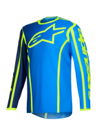 Alpinestars 2026 Fluid Apex Jersey, jersey de motocross, azul y amarillo flúor, gran logotipo de estrella amarillo fluorescente en el pecho, mangas largas con secciones en azul marino y azul brillante, marca vertical en el brazo, equipamiento deportivo todoterreno