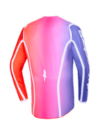 Jersey Alpinestars Fluid Apex 2026, vista trasera, degradado multicolor rosa, púrpura y naranja, con ribetes curvos blancos y dobladillo trasero extendido, ropa profesional de motocross y off-road