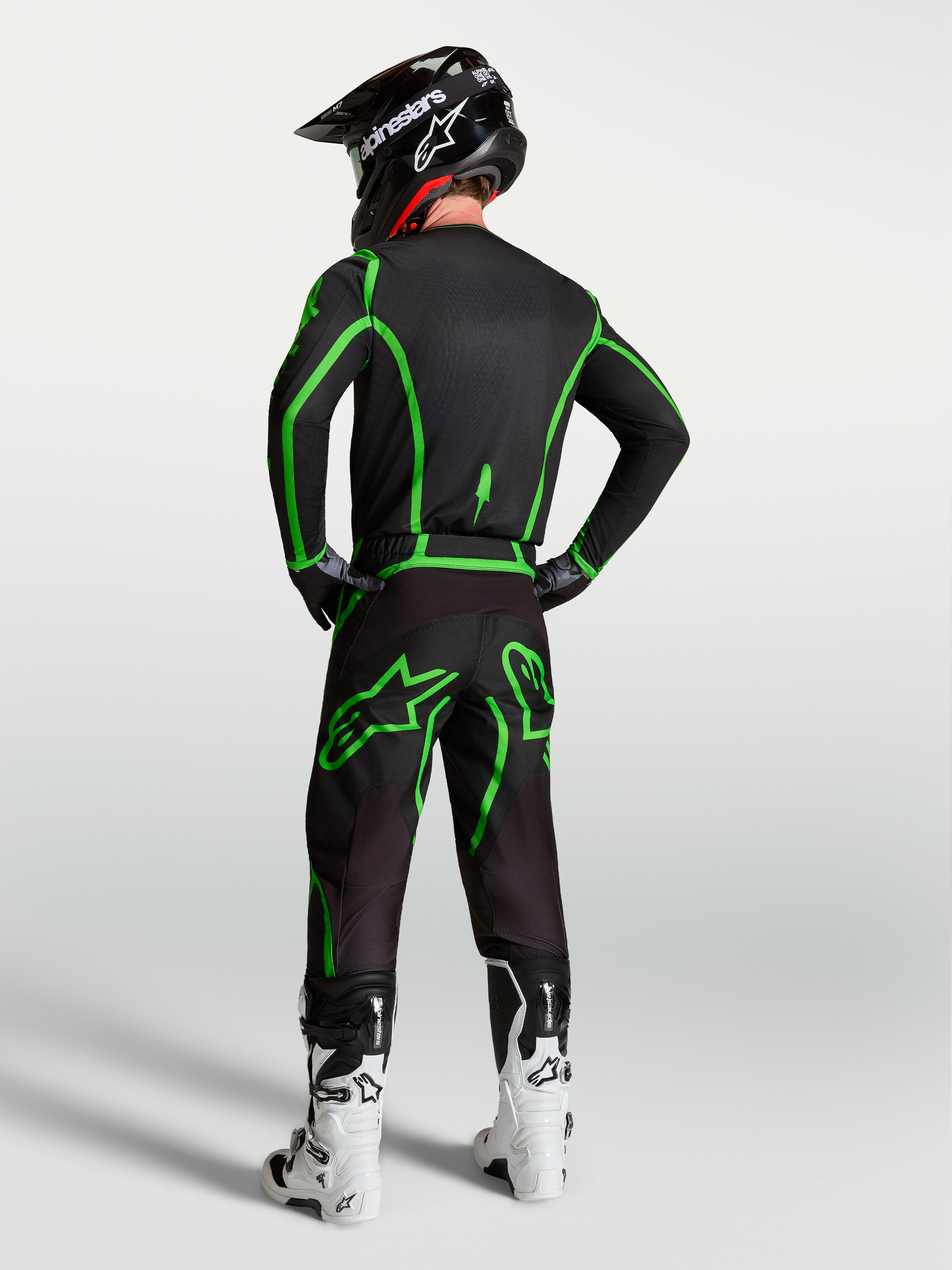 Alpinestars Fluid Apex V2, pantalones de motocross para hombre, negros y verdes flúor, con ajuste ergonómico.