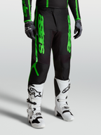 Alpinestars Pantalones Fluid Apex V2, equipo de motocross para hombre, negros y verdes fluorescentes, polifabric 600D reforzado, diseño off-road con piernas precurvadas