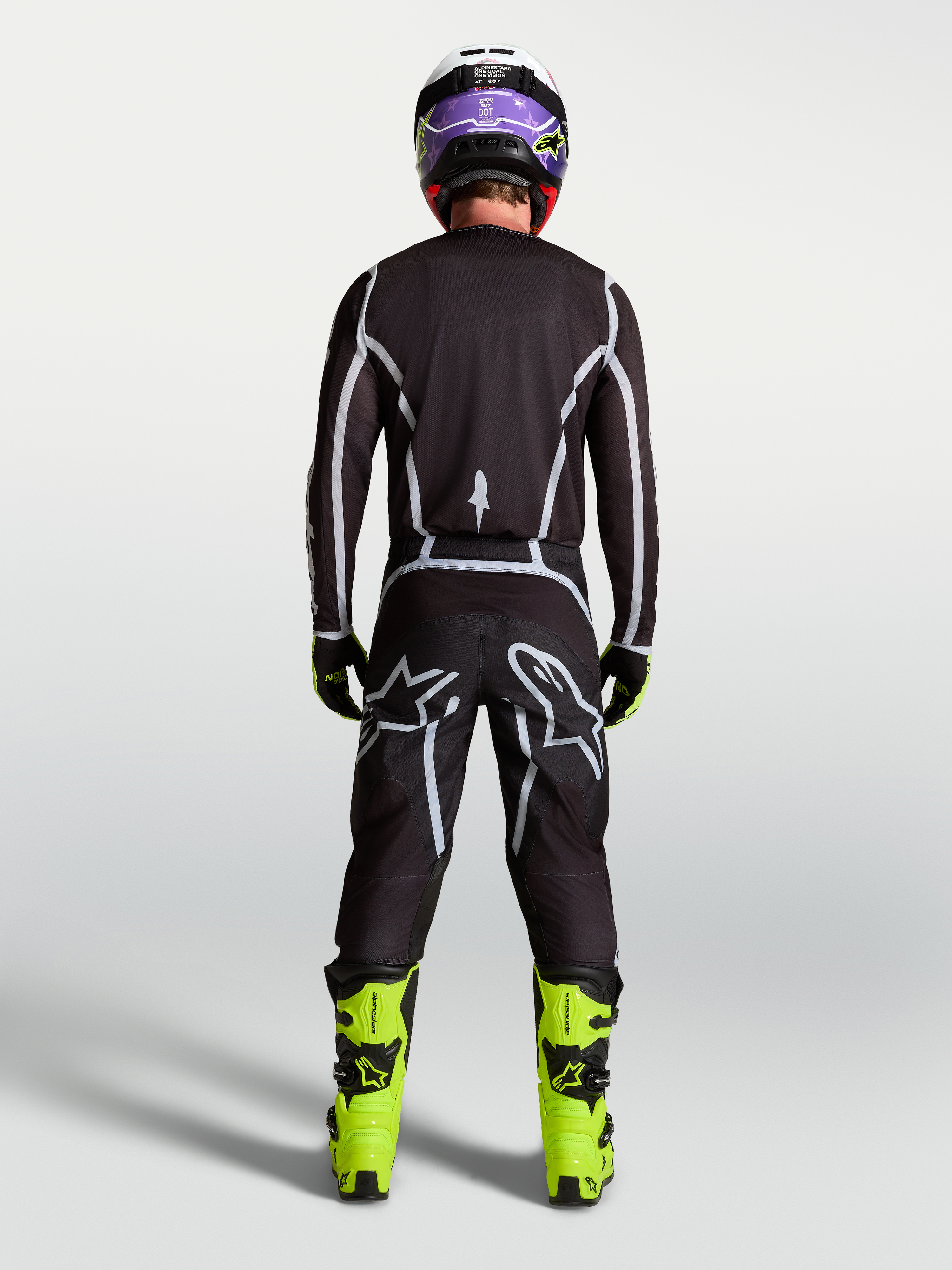 Jersey Alpinestars Fluid Apex V2, equipo de motocross de hombre, negro y plateado, vista trasera con kit de carreras completo