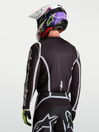 Alpinestars Jersey Fluid Apex V2, jersey de motocross para hombre, negro y plateado, diseño ergonómico de polifabricado