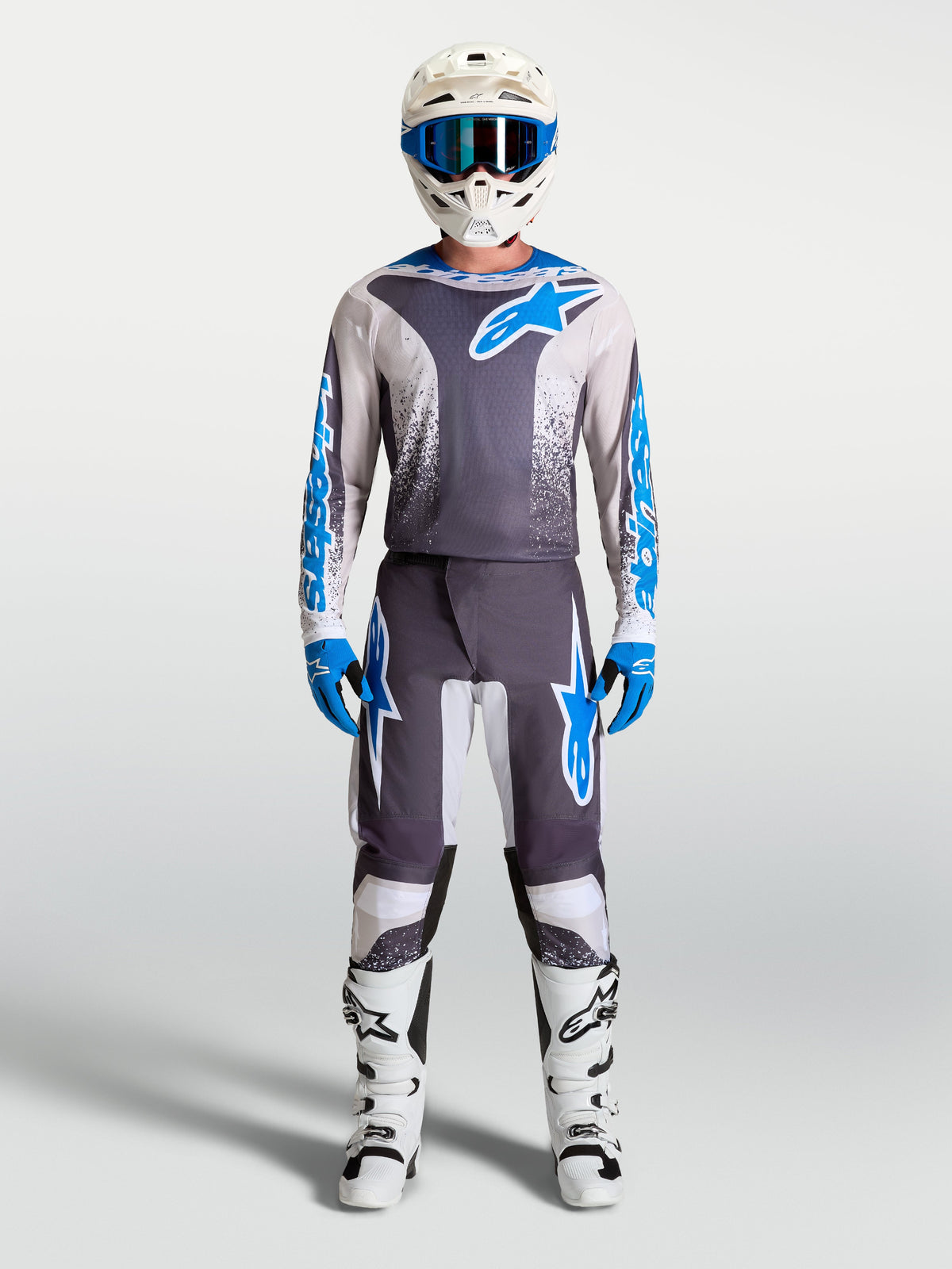 Alpinestars Fluid Drag Gear Set 2027, conjunto de motocross en gris y azul, jersey y pantalones técnicos para off-road