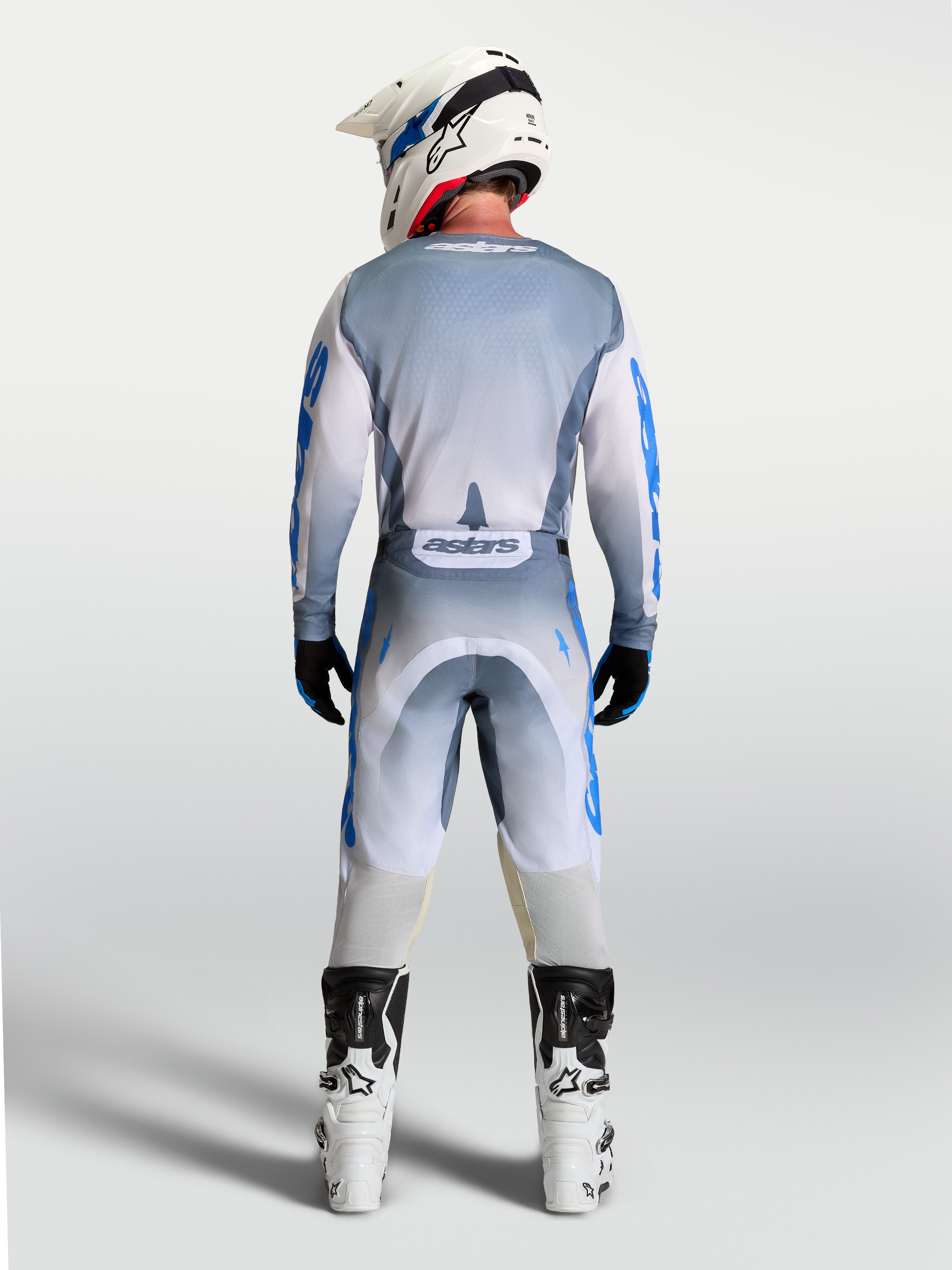 Jersey Alpinestars Racer Amber, equipo de motocross para hombre, gris y azul, vista trasera completa en modelo
