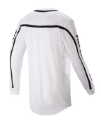 Alpinestars 2023 Racer Found Jersey, jersey de motocross, blanco, vista trasera con franjas negras en los hombros y las mangas, dobladillo trasero más largo para mayor cobertura, construcción de poli-tejido ligero