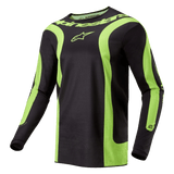 Alpinestars Fluid Lurv Jersey 2024, jersey de motocross, negro y amarillo flúor, con llamativos paneles curvos en amarillo fluorescente, logotipo de Alpinestars en el pecho y marca alrededor del cuello, corte deportivo atlético para carreras off-road