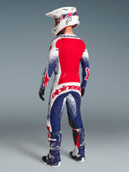 Alpinestars Techstar Unity, jersey de motocross de hombre, edición limitada, rojo, blanco y azul, vista trasera ventilada.