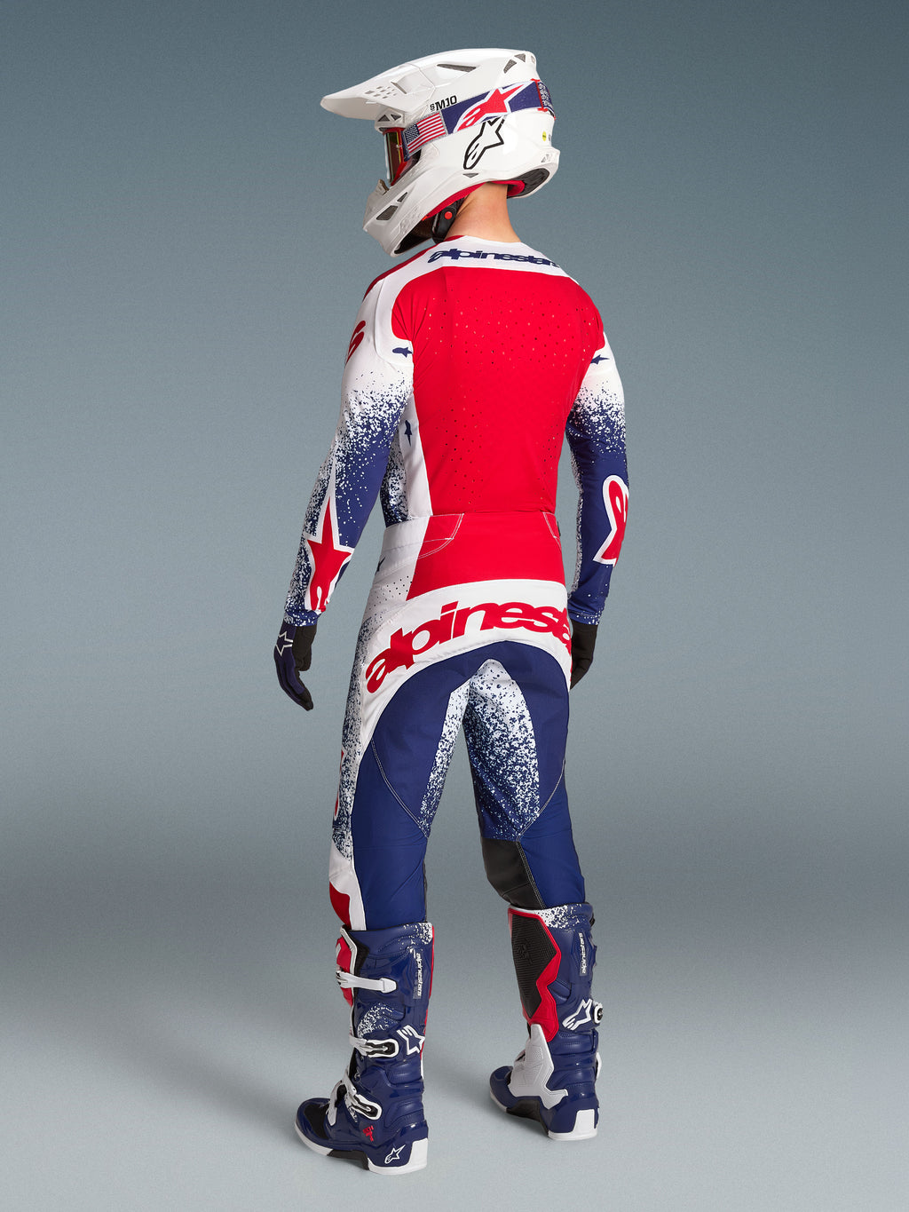 Alpinestars Techstar Unity, jersey y pantalones de motocross para hombre, rojos, blancos y azules, vista trasera