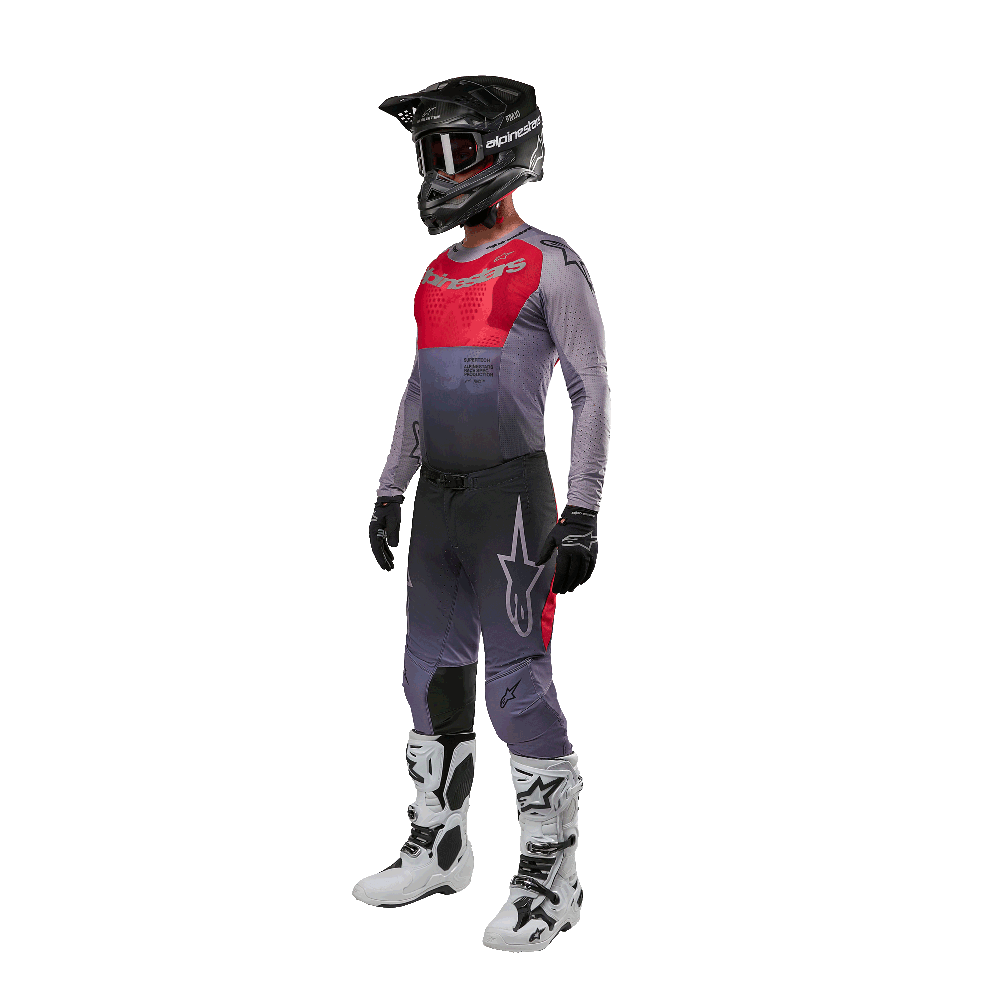 Motocross rider wearing complete racing gear, Alpinestars 2024 Supertech Dade Jersey in Iron Red Berry and grey, matching grey pants with red accents, black helmet with goggles, white and black boots, black gloves, coordinated outfit for off-road racing