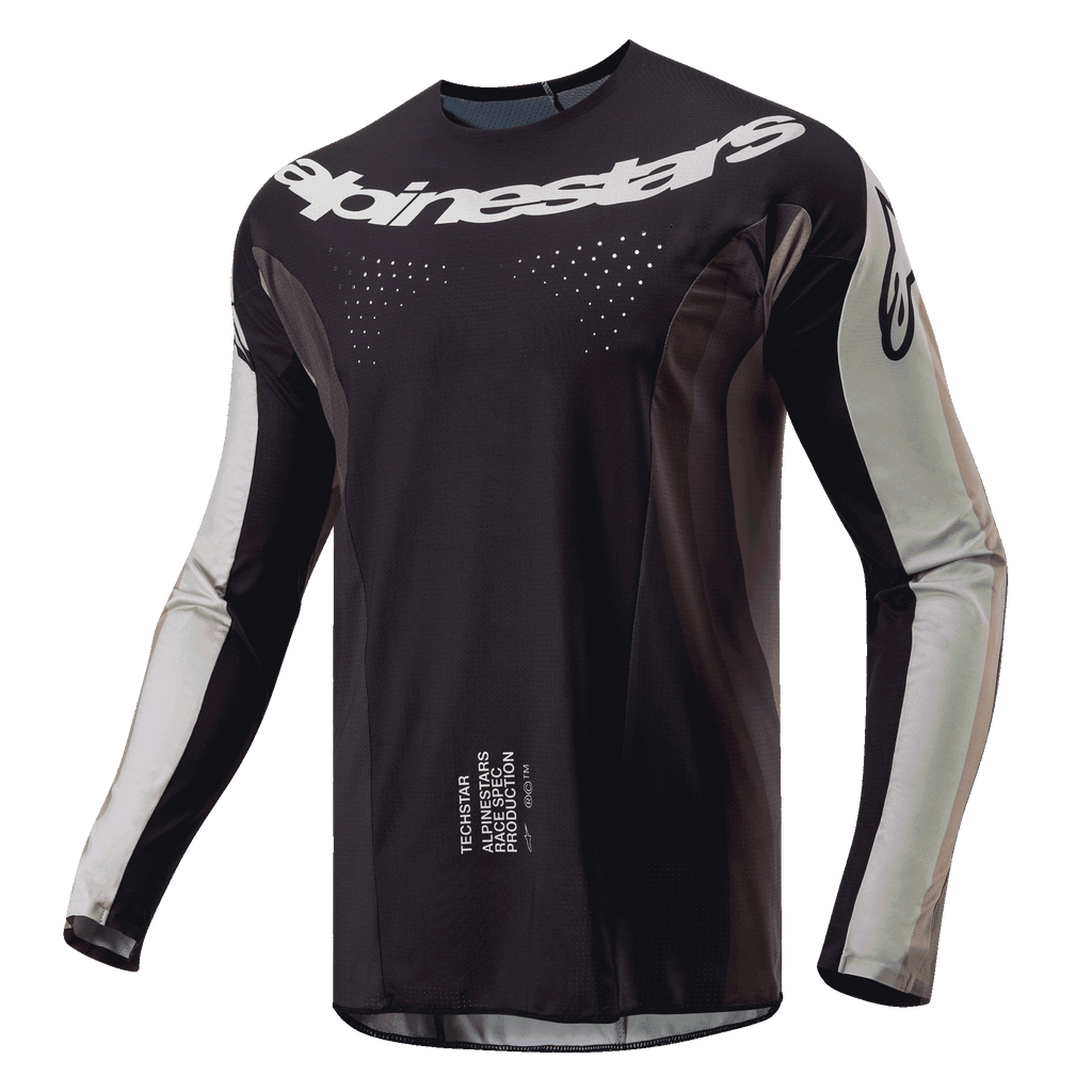 Alpinestars 2024 Techstar Pneuma Jersey, jersey de motocross, arena oscura y gris Iron Dust, cuerpo principal negro con paneles de las mangas en gris claro, logotipo de Alpinestars blanco en el pecho, perforaciones de ventilación cortadas con láser, equipamiento de alto rendimiento para conducción off-road