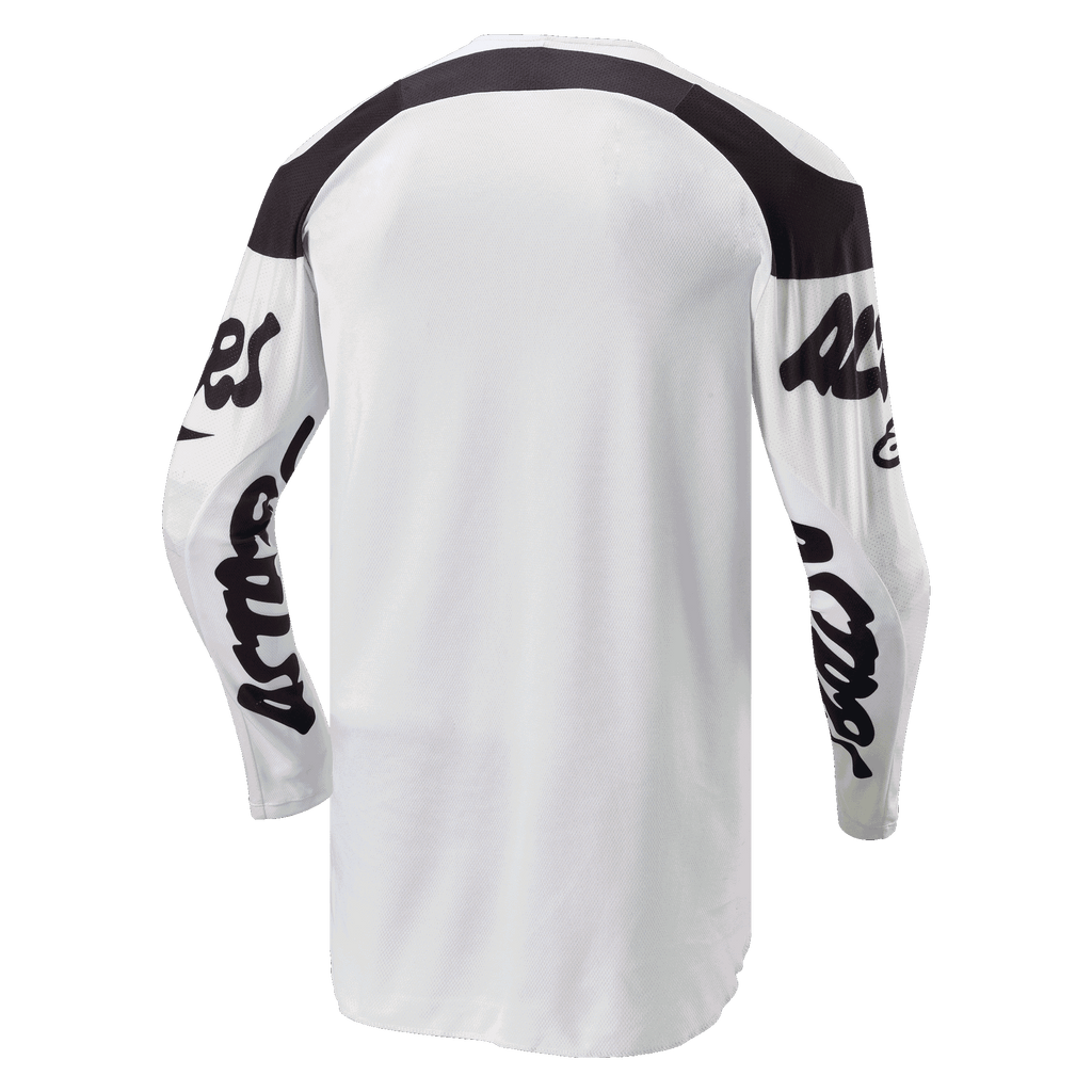 Alpinestars 2024 Racer Hana Jersey, jersey de motocross, blanco y negro, vista posterior con parte trasera alargada para mayor cobertura, paneles negros en los hombros y logotipos de texto negros en las mangas, tejido duradero que absorbe la humedad para rendimiento todoterreno