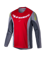 Alpinestars 2025 Youth Racer Melt Jersey, jersey de motocross juvenil, rojo brillante y gris, con un gran logotipo blanco en el pecho y detalles en amarillo neón en los hombros, tejido técnico de manga larga para conducción off-road