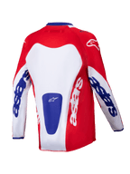 Alpinestars 2025 Youth Racer Veil Jersey, jersey de motocross, rojo brillante y blanco con detalles azules, vista posterior que muestra la marca 'astars' en las mangas y la espalda, diseñado para el rendimiento off-road juvenil