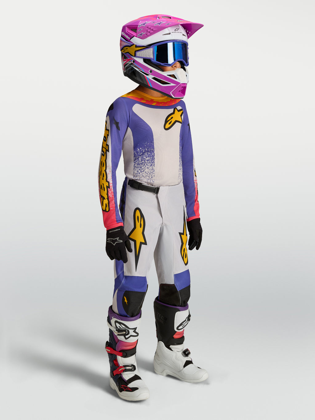 Alpinestars Youth Fluid Drag Gear Set, conjunto de motocross juvenil, azul y blanco con detalles rosa y dorados
