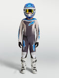 Conjunto juvenil Alpinestars Fluid Drag 2027, equipo de motocross para niños en gris y azul para rendimiento off-road.