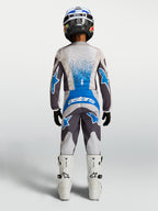 Alpinestars conjunto juvenil Fluid Drag 2027, equipo de motocross gris y azul, textil y transpirable, vista posterior
