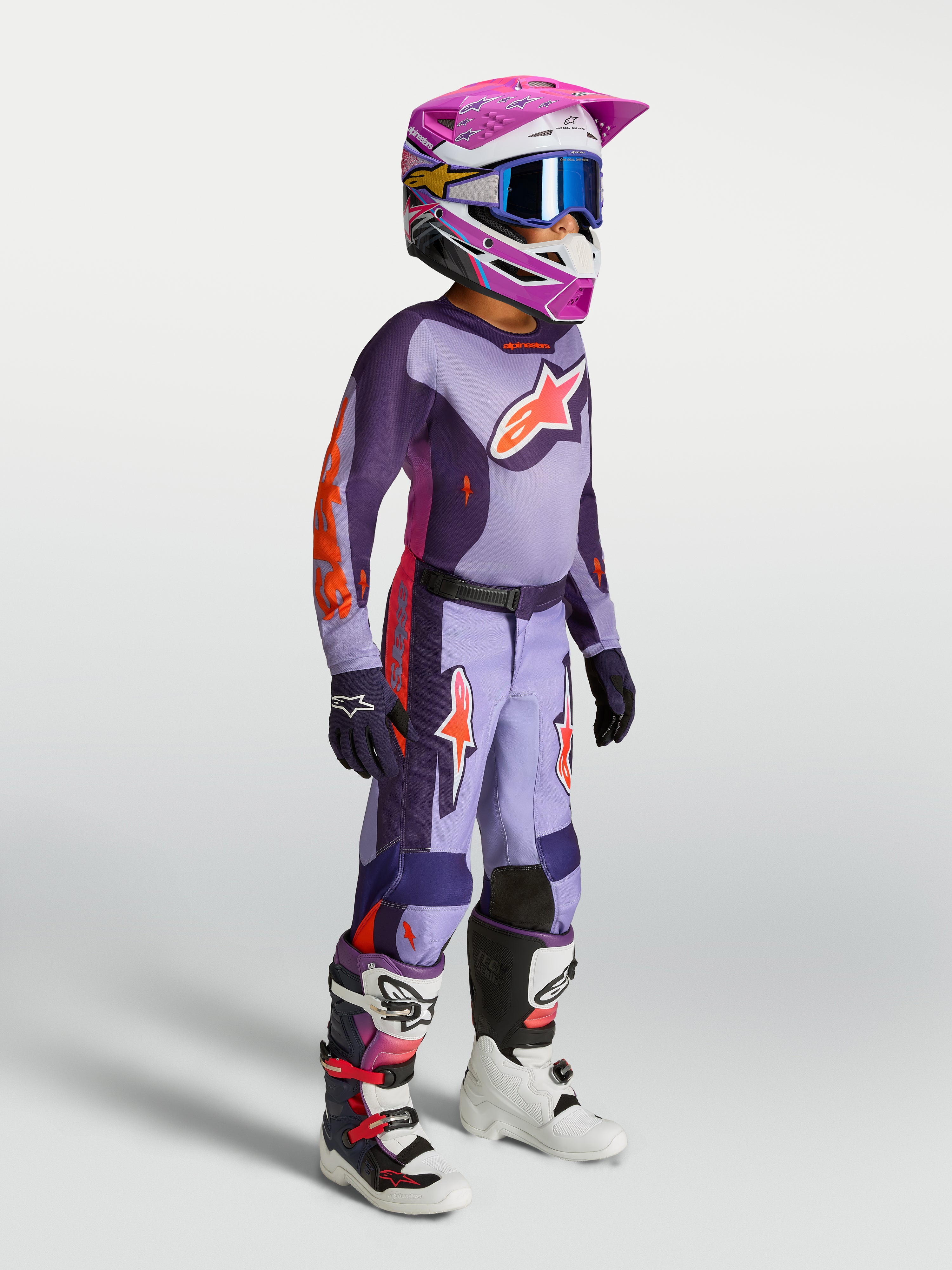 Alpinestars Youth Fluid Hunt Gear Set, conjunto de motocross juvenil morado y rosa flúor, piloto off-road con casco y botas