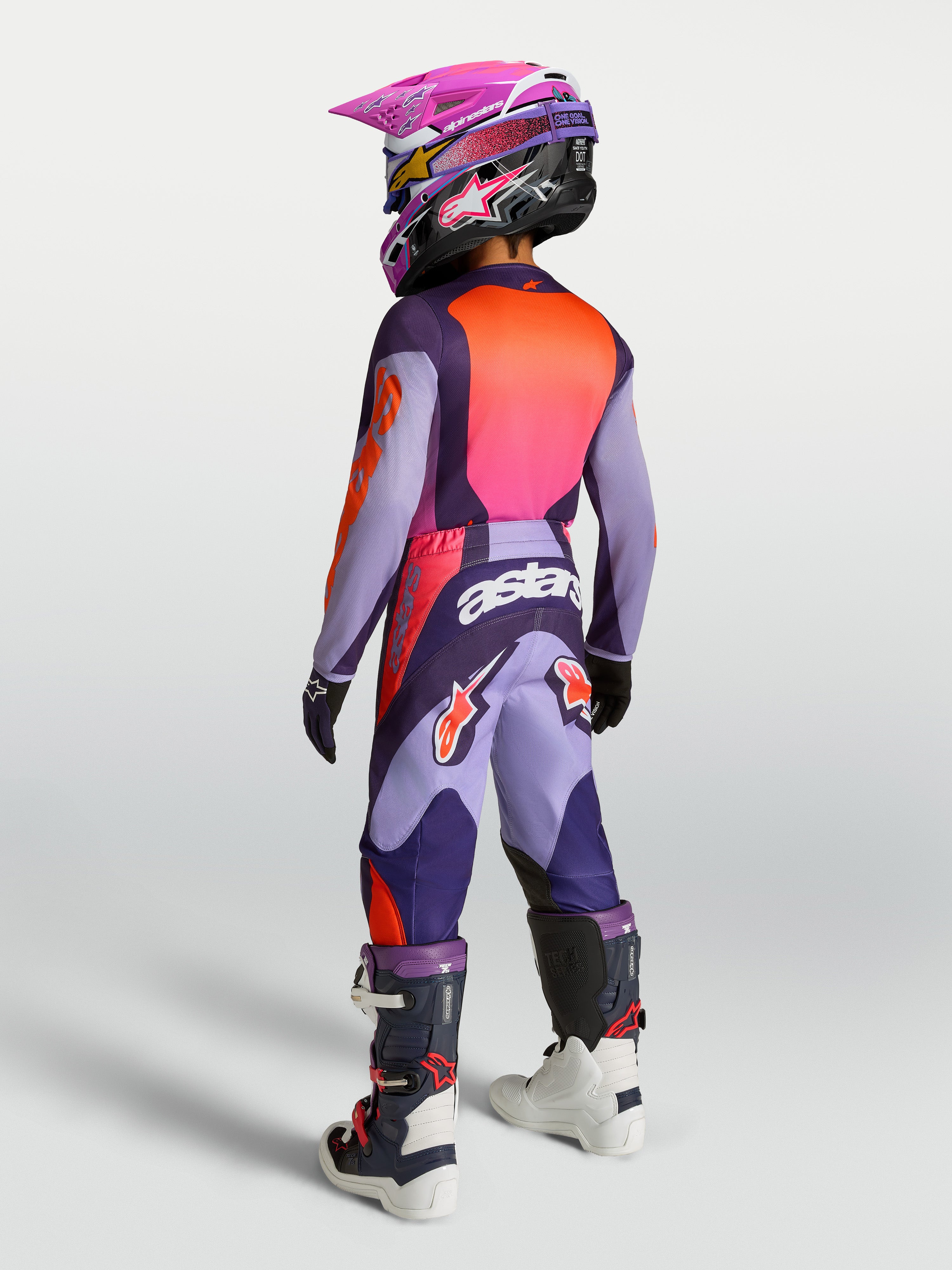 Alpinestars jersey y conjunto Fluid Hunt juvenil 2027 morado y rosa flúor, vista trasera de kit de motocross