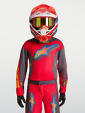 Alpinestars Jersey Fluid Hunt Juvenil, equipo de motocross rojo y gris, modelo con casco de carreras