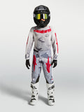 Alpinestars 2027 Fluid Lone Juvenil, conjunto de motocross gris camuflaje y rojo fuego para carreras todoterreno