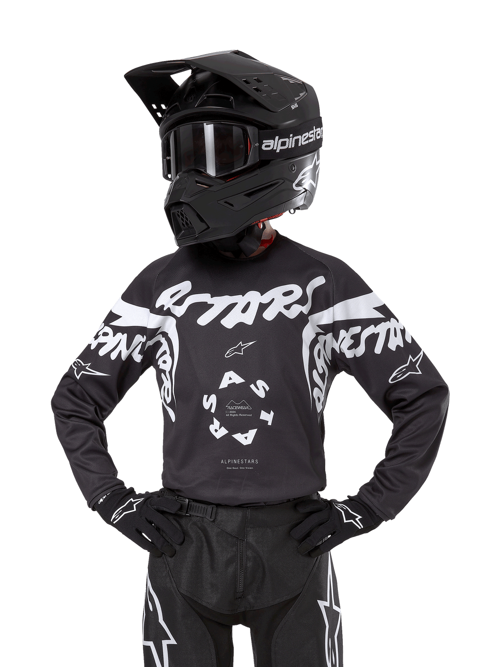 Alpinestars 2024 Youth Racer Hana Jersey, camiseta de motocross para jóvenes, negra con gráficos blancos, diseño deportivo con logos ASTARS y Alpinestars, mostrada con casco negro, gafas, guantes y pantalones de competición a juego