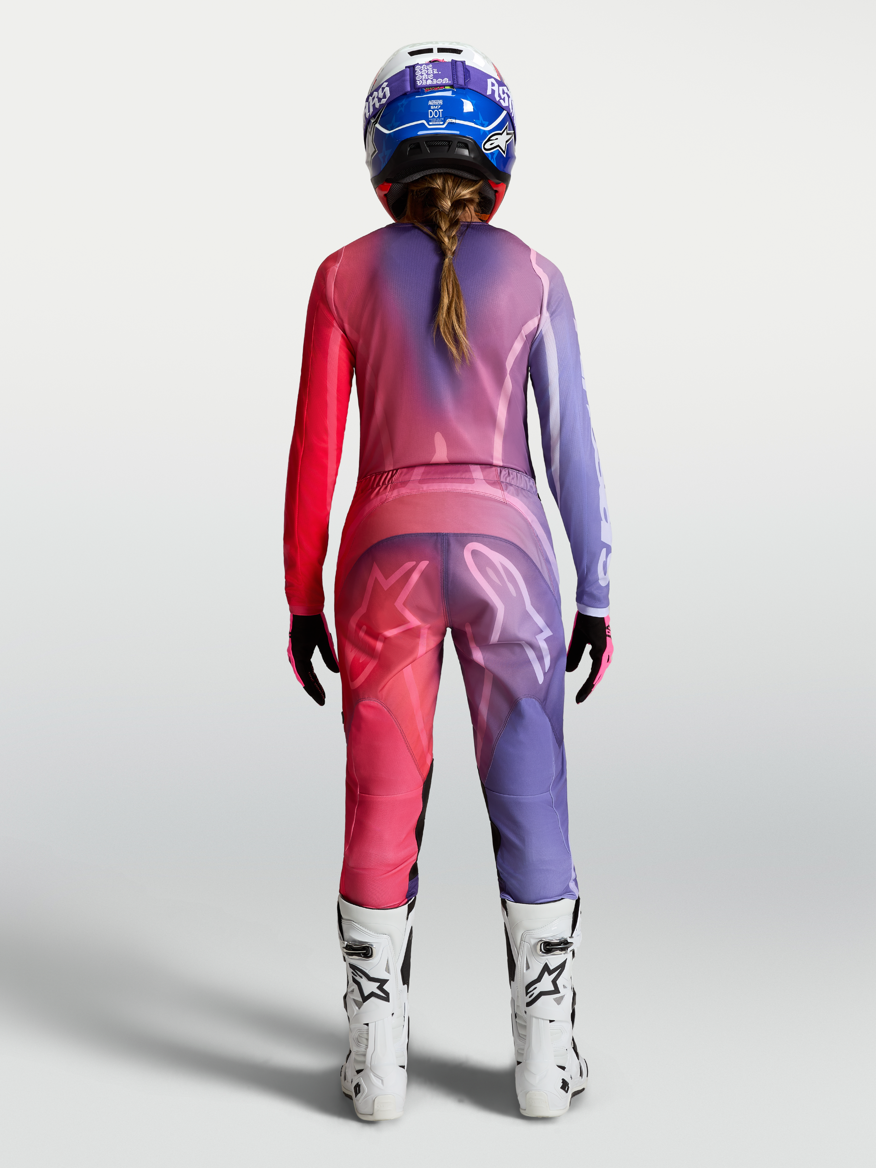 Jersey Stella Fluid Kepler de Alpinestars, jersey de motocross para mujer, morado y rojo, polifabricado, vista trasera.