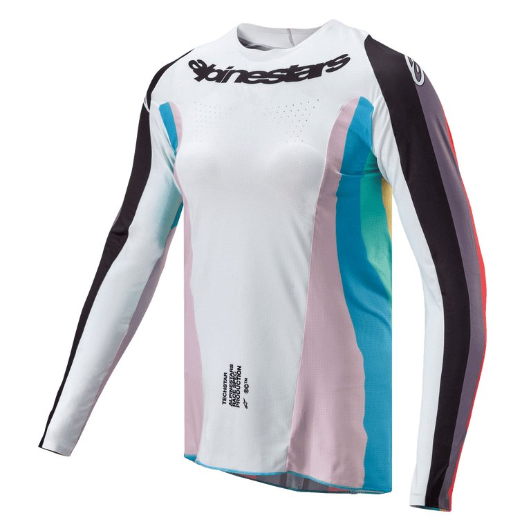 Alpinestars Stella Techstar Jersey 2024 para mujer, jersey de motocross, negro multicolor, cuerpo blanco con paneles laterales en rosa y verde azulado, mangas con rayas negras, logotipo de Alpinestars en el pecho, ajuste atlético femenino con perforaciones de ventilación