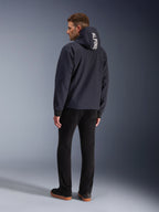 Alpinestars Radium Tech Hoodie, black urban motorcycle jacket, windproof 3L shell, rear view with white hood logo.