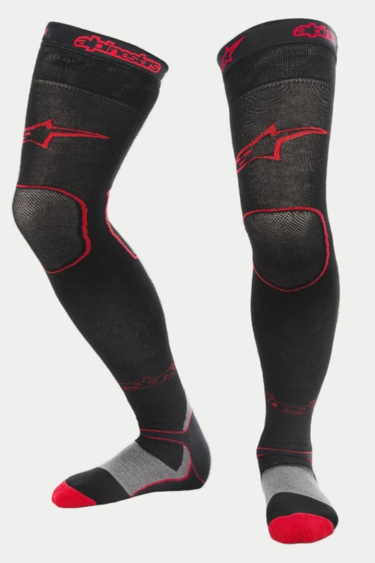 Alpinestars MX Long Tech Thick Socks, calcetines para motocross, negro y rojo, con logos de Alpinestars en rojo en el muslo y el puño, talón gris y detalles en rojo en la puntera, longitud hasta la mitad del muslo con zonas de malla especializadas, capa base técnica para carreras todoterreno