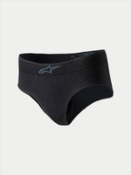 Alpinestars Stella TECH ZX Briefs, ropa interior de carreras para mujer, color negro con logo gris en la cintura, capa base ligera e ignífuga, certificación FIA 8856-2018, diseñada para el rendimiento en automovilismo.