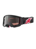 Alpinestars Supertech Corp Goggles Absolute Vision, Motocross Goggles, Black and Red with Mirror Silver Lens, featuring "ONE GOAL. ONE VISION." branding, black strap with large red and white star logo, angular frame design with foam padding, premium off-road eye protection