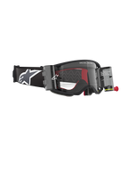 Alpinestars Supertech Corp Goggles Roll Off, Black and Grey, featuring a Wide Vision Roll-Off system with transparent canisters, a clear lens with silicone glide lines, and a wide black strap with the white Astars logo, designed for professional motocross and off-road racing.