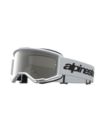 Alpinestars Vision 3 Wordmark Mirror, gafas de motocross blancas con lente de espejo plateada y correa con logotipo negro.