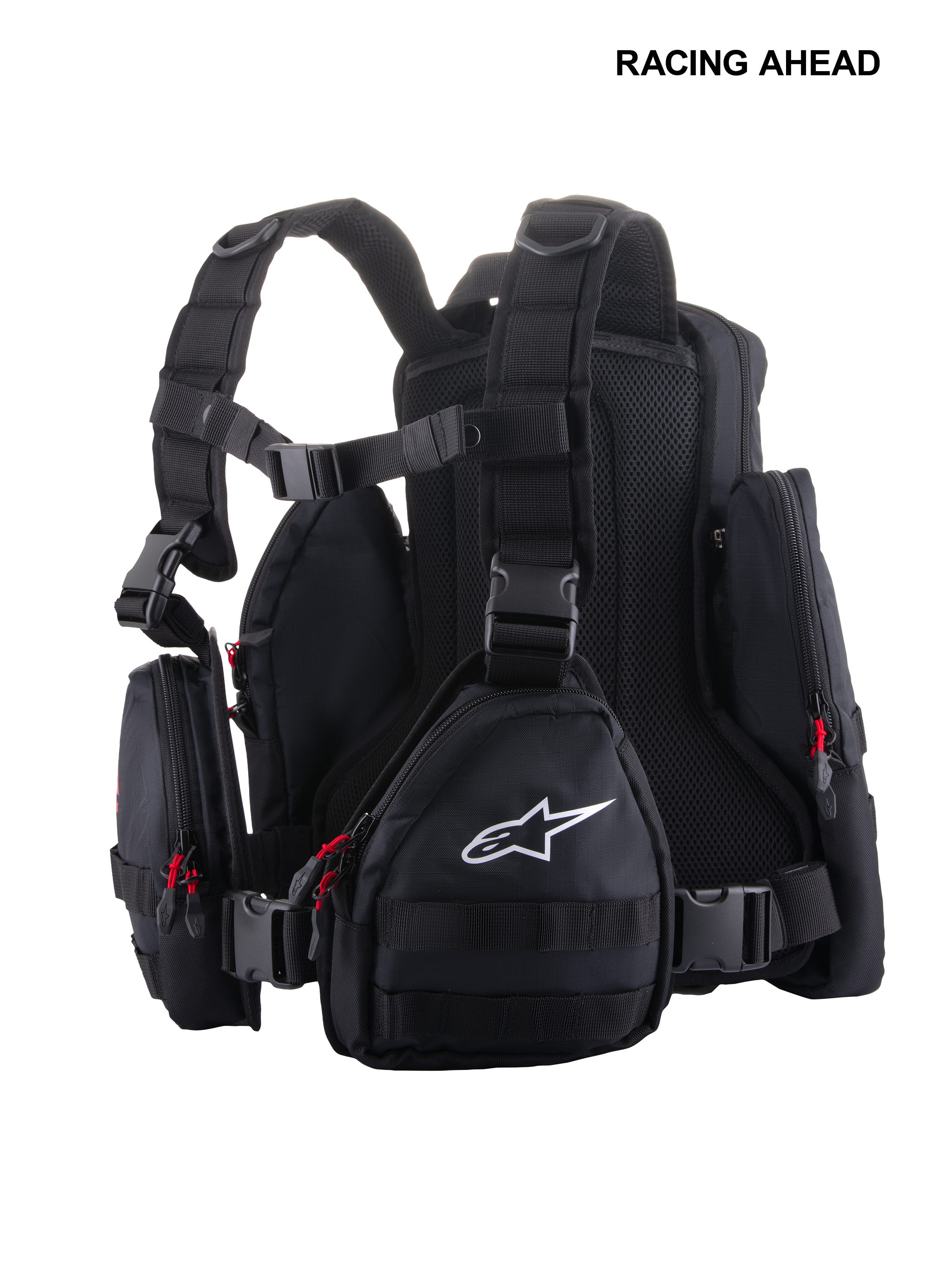 Alpinestars Techdura Tactical Pack, Black and White modular motorcycle backpack, featuring multiple detachable pouches, MOLLE webbing, red zipper pulls, and ergonomic mesh padding, designed for enduro and off-road riding.